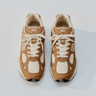 Close up view of a New Balance Made in UK sneaker tongue and laces.  