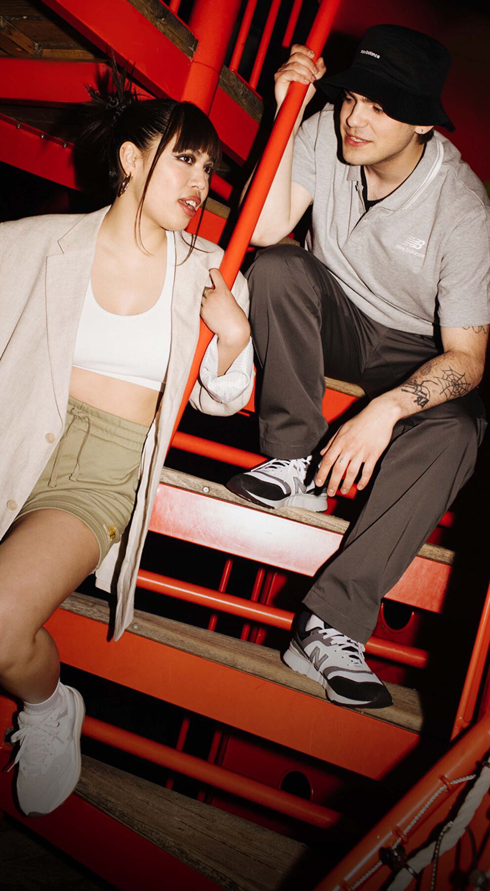 two people sitting on the stairs